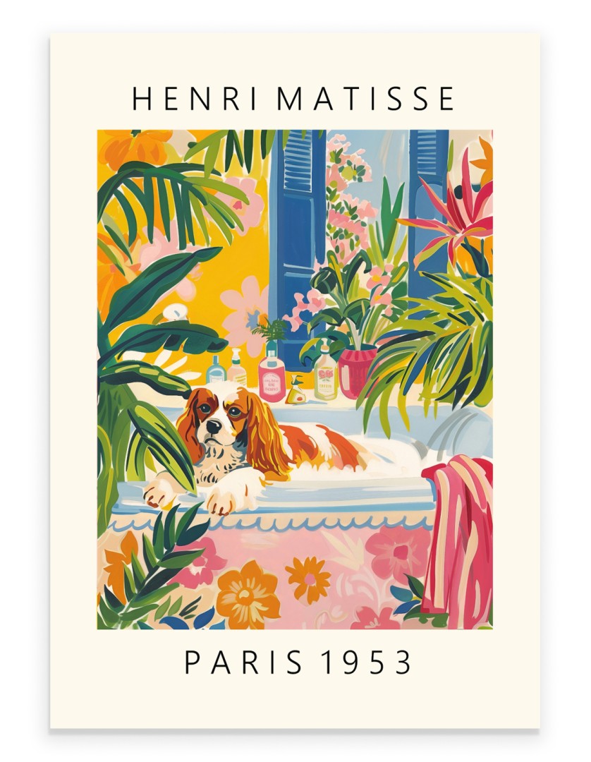 Cavalier King Charles Spaniel lounging in a bathtub with tropical plants.