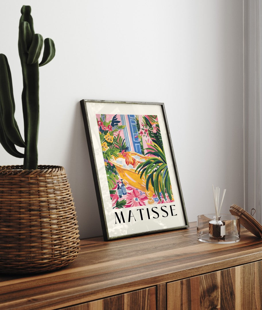 Decorative rooster print in a Matisse-style setting with exotic plants, pink florals, and bright sunlight.