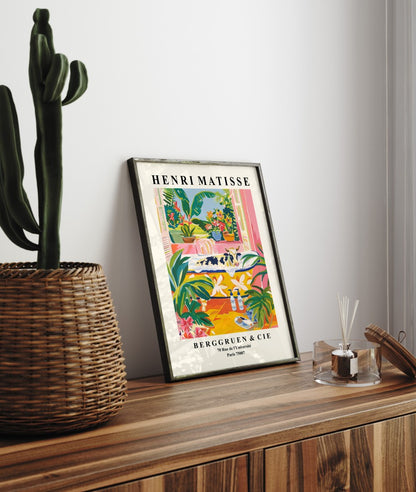 Framed art print featuring a cow in a bathtub with floral decor