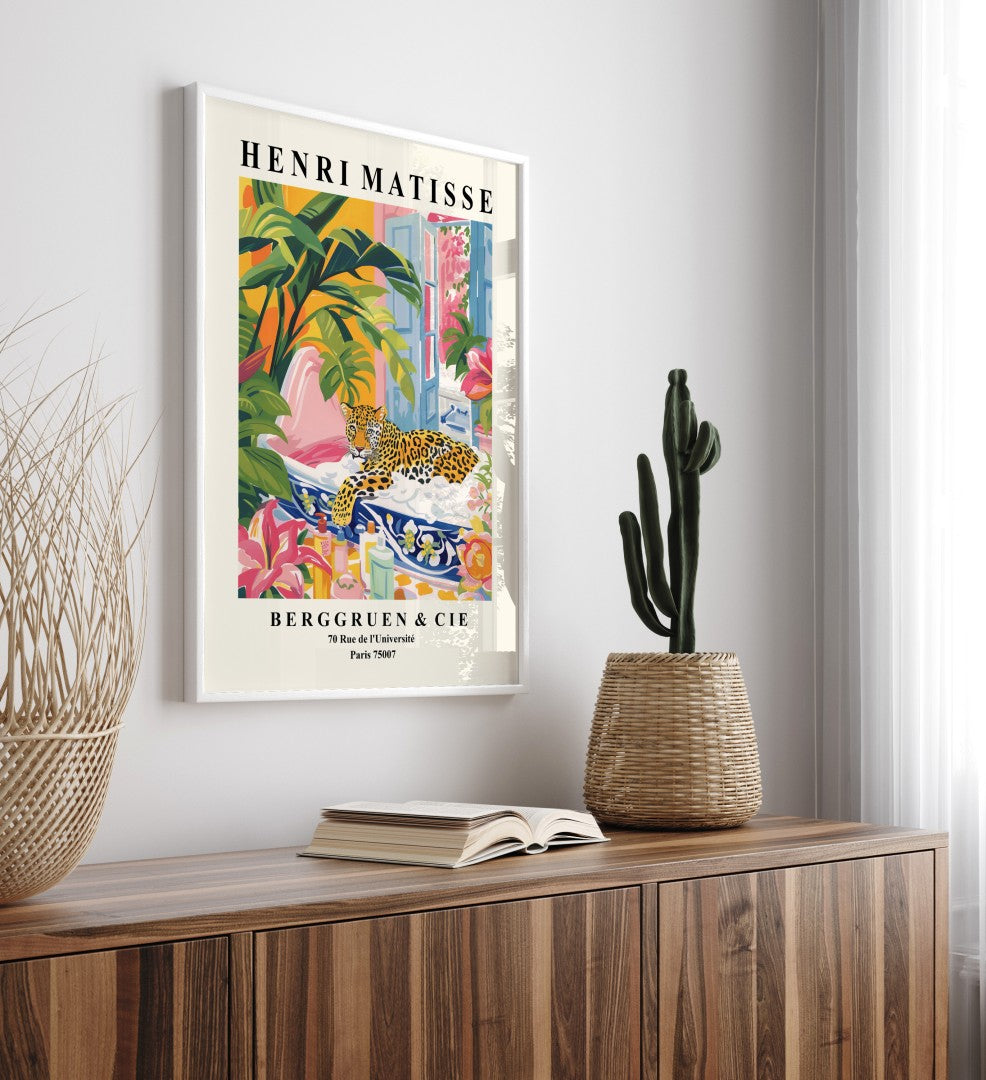 Framed wall art featuring a relaxed leopard in a botanical bath - Matisse style